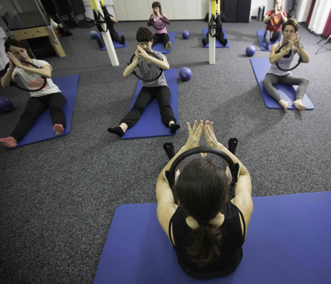 Cours collectif de Pilates au sol
